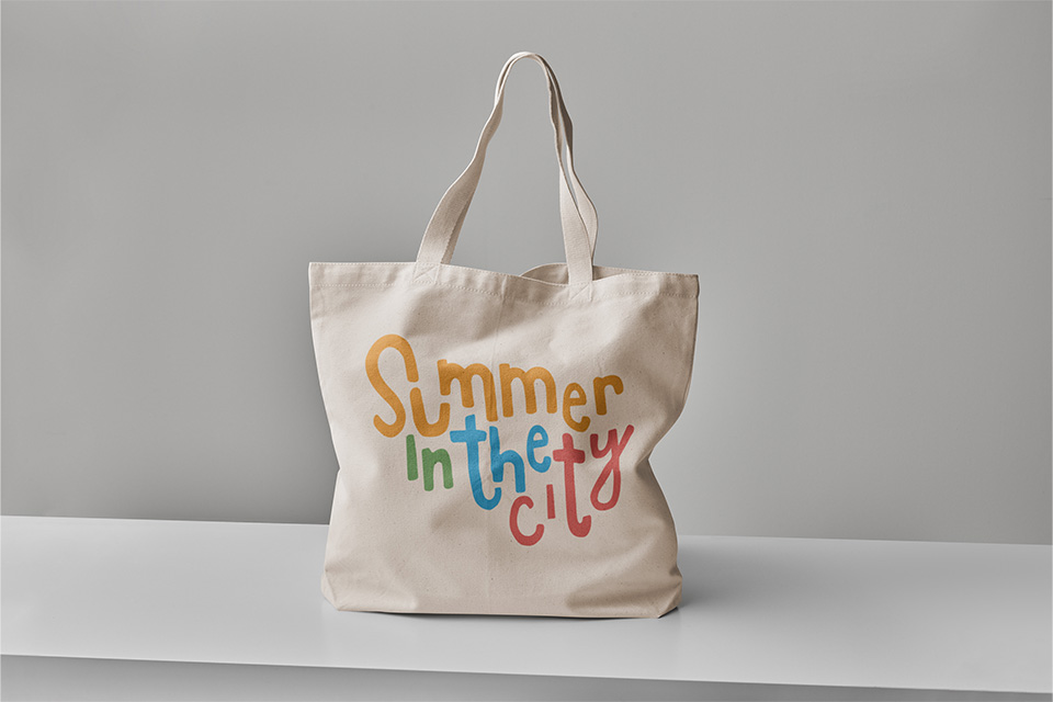 Summer in the City Logo shown on a totebag.